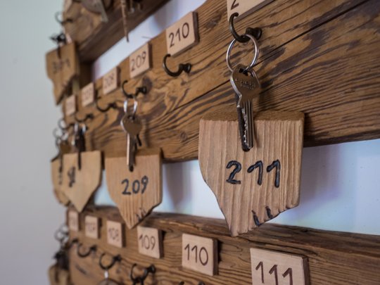Hotel in Pflerschtal: Aktivhotel Panorama Keys hanging on wooden room number tags on a wall