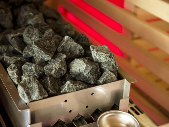 Hotel in Pflerschtal: Aktivhotel Panorama Sauna heater with hot stones and red light in the background